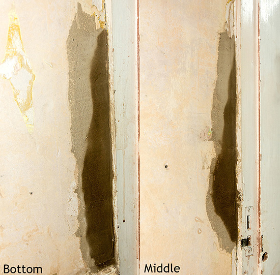 cemented holes next to door frame