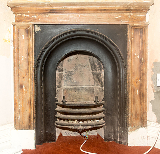 Paint stripped fireplace