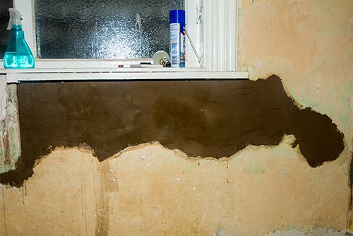 Cement filled hole under window